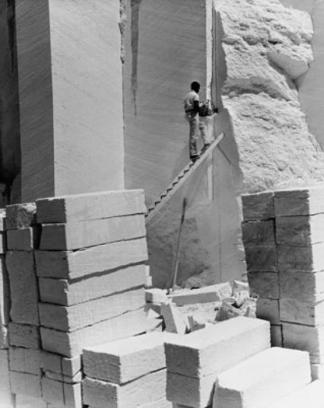Man standing on the step ladder and quarrying blocks of limestone Bermuda Canvas Art - (24 x 36)