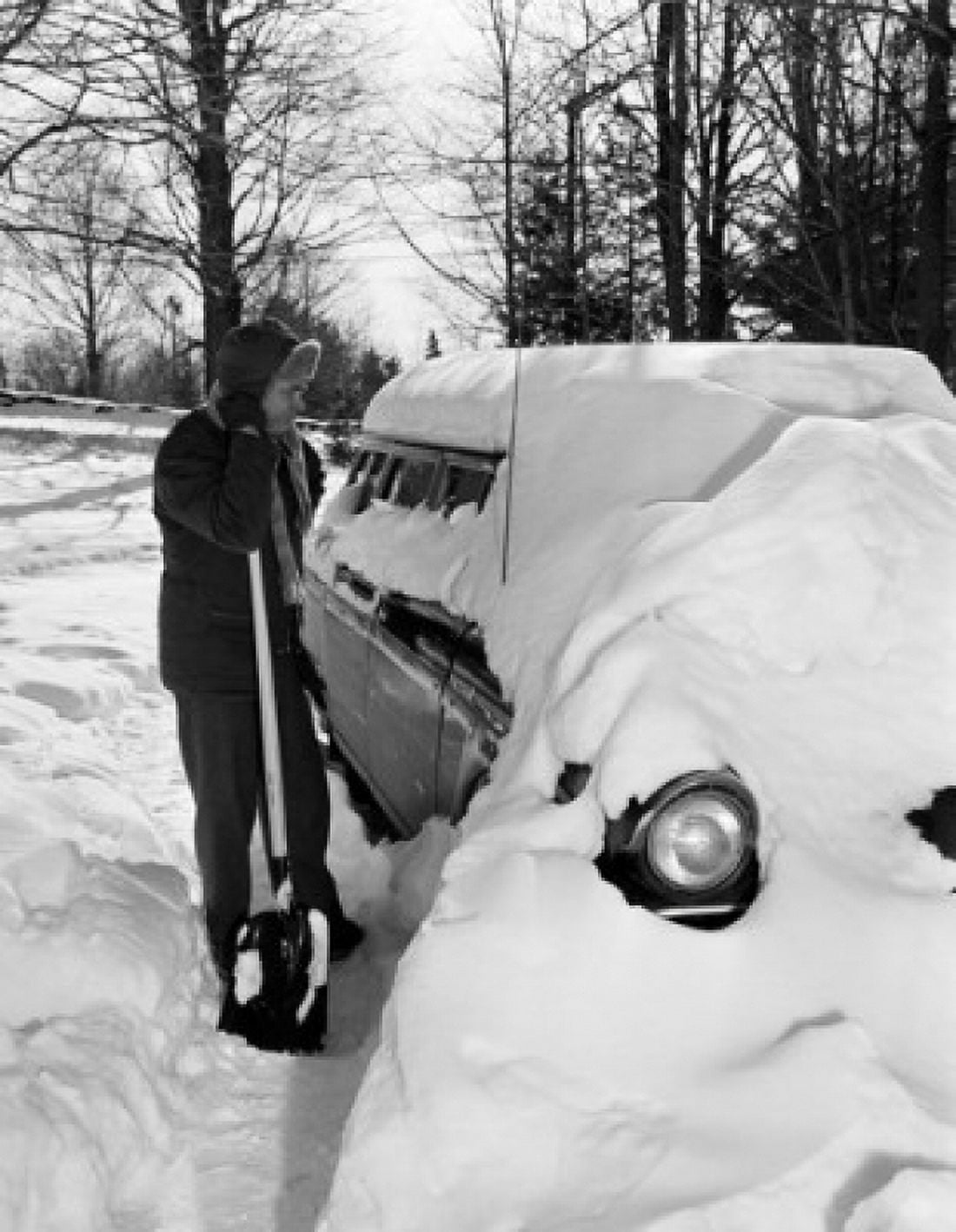 Man taking out snow Canvas Art - (24 x 36)