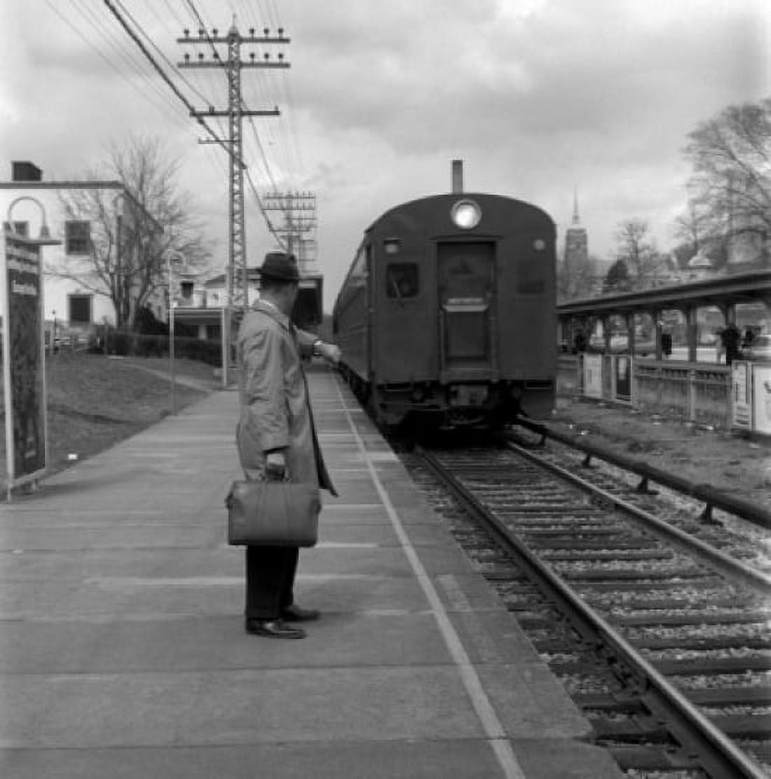Man waiting at railroad station and checking time Canvas Art - (18 x 24)