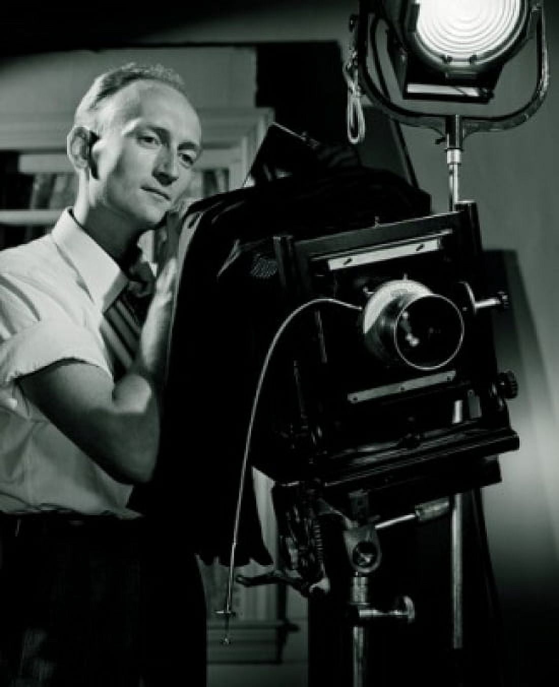 Man with old fashioned camera in studio Canvas Art -  (18 x 24)