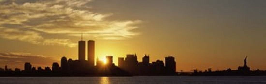 Manhattan skyline and a statue at sunrise Statue Of Liberty New York City New York State USA Canvas Art - Panoramic Images (36 x 12)
