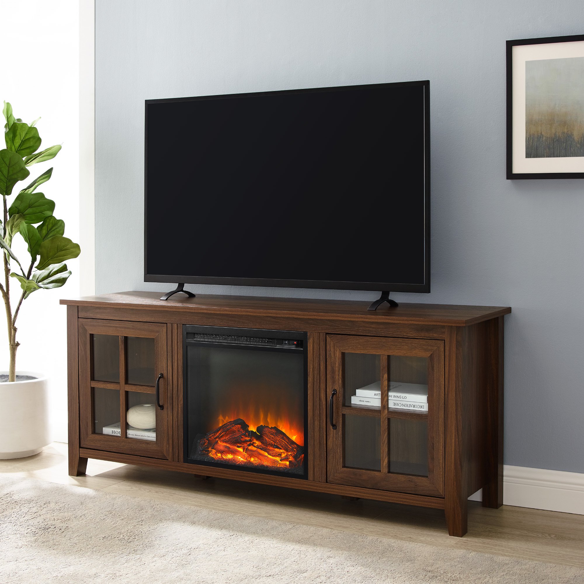 https://www.walmart.com/ip/Manor-Park-Traditional-Glass-Door-Fireplace-TV-Stand-for-TVs-up-to-65-Dark-Walnut/854932859