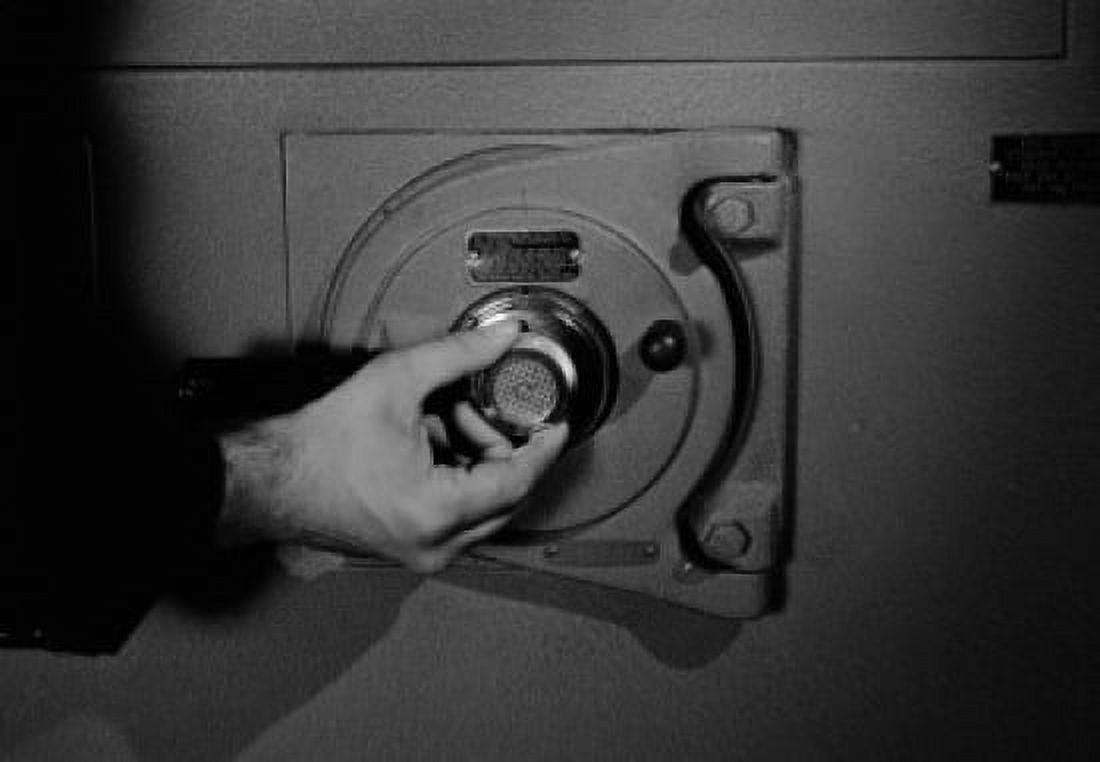 Mans hand unlocking safe Canvas Art - (24 x 36)