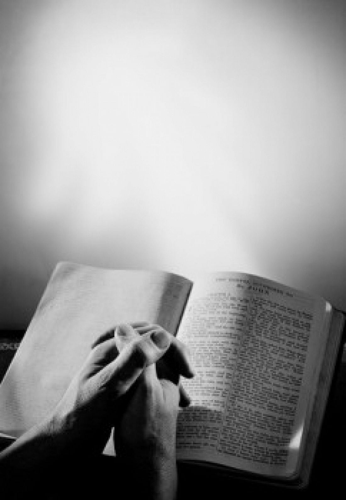 Mans hands clasped by bible Canvas Art - (18 x 24)