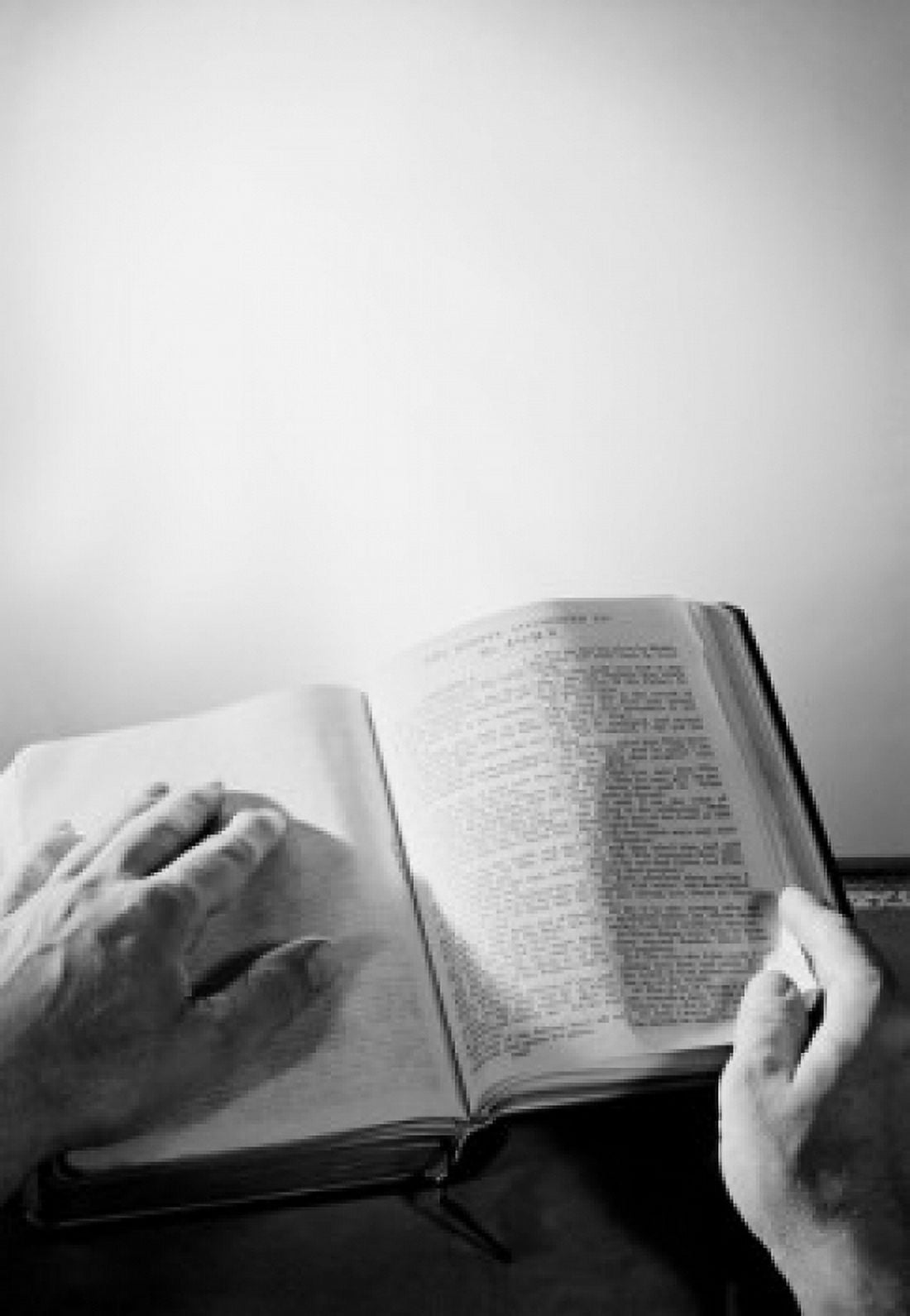 Mans hands on bible Canvas Art - (24 x 36)