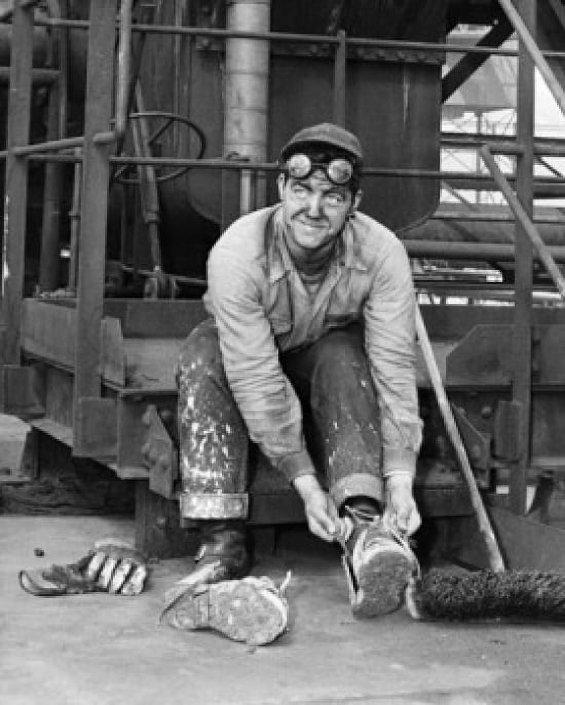Manual worker putting on shoes US Steel Geneva Utah USA Canvas Art - (24 x 36)