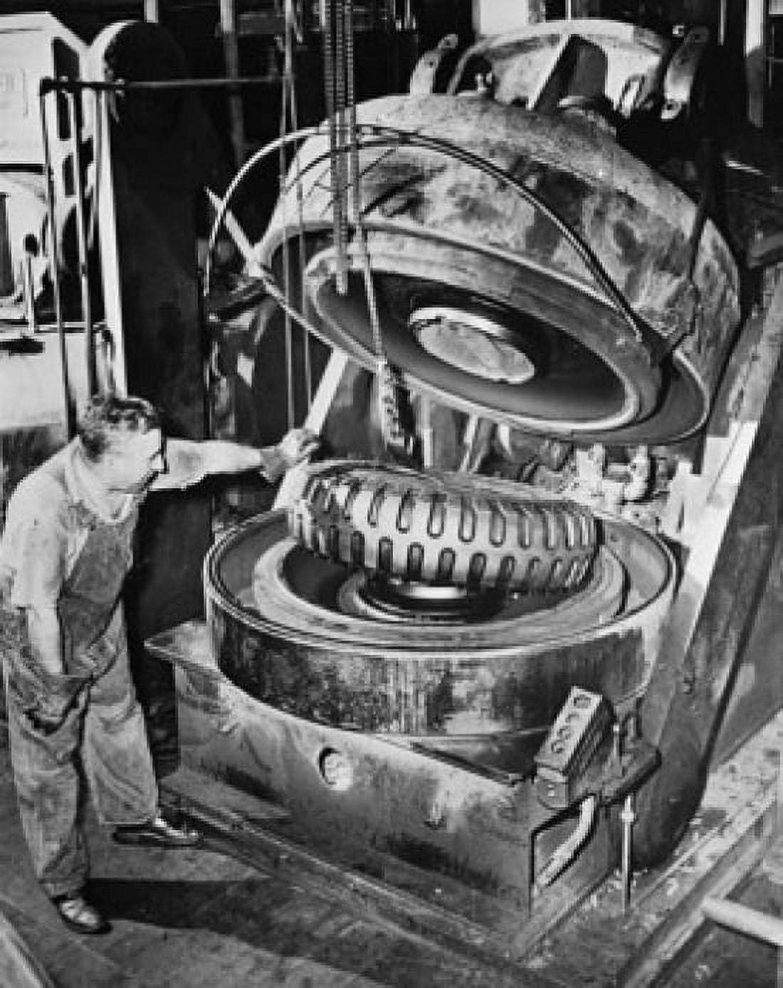 Manual worker removing a tire from a mold Canvas Art - (18 x 24)