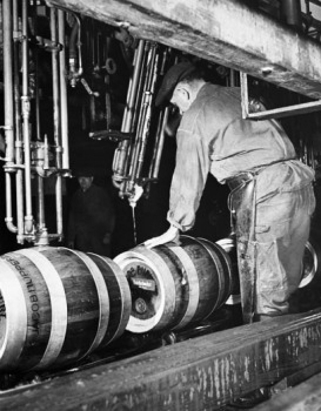 Manual workers working on a machine in a distillery Rupperts Brewery New York City New York State USA Canvas Art - (18 x 24)