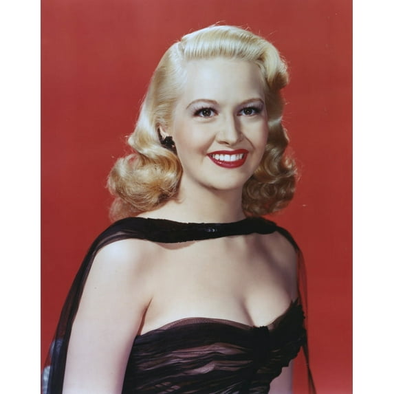 Marilyn Maxwell smiling in Black Dress with Red Background Photo Print (8 x 10)