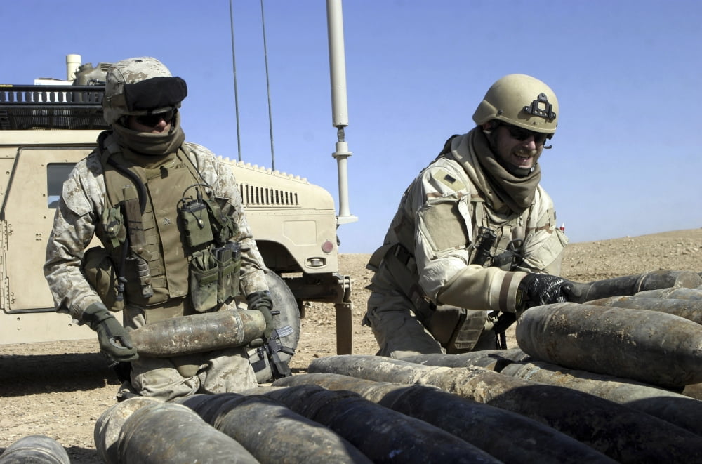 Marines and Sailors stack rockets mortars and bags of repellant Canvas Art - Stocktrek Images (34 x 23)