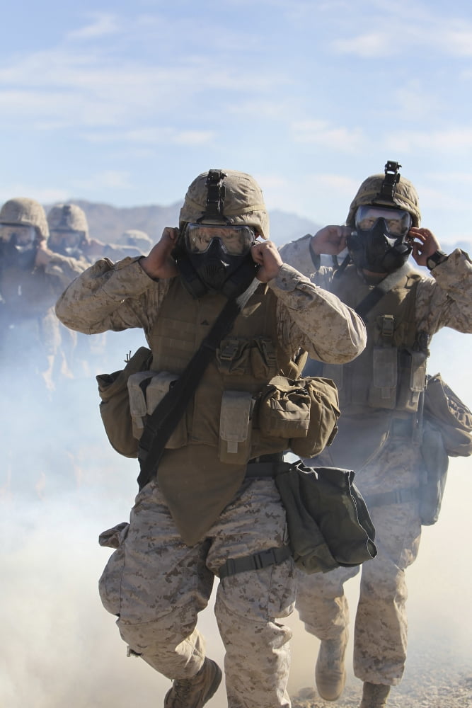 Marines and sailors participate in an outdoor gas exercise in full protective gear Canvas Art - Stocktrek Images (23 x 35)