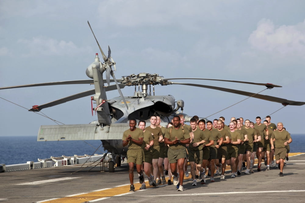 Marines and sailors run aboard USS Makin Island Canvas Art - Stocktrek Images (35 x 23)