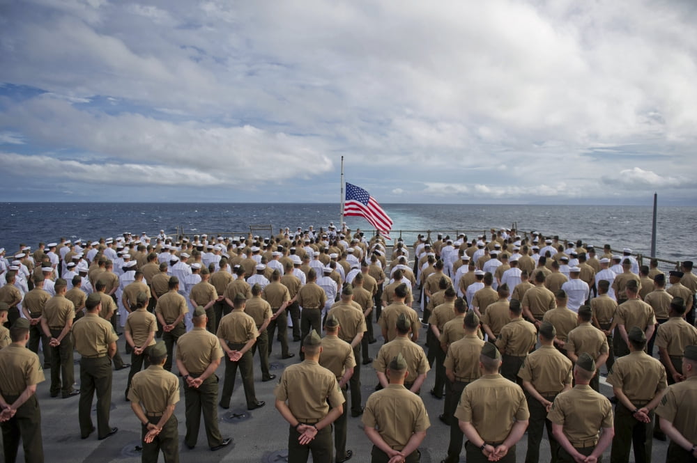Marines and sailors stand in formation during a ceremony on USS Pearl Harbor Canvas Art - Stocktrek Images (35 x 23)