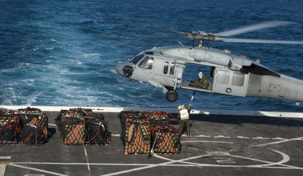 Marines attach cargo to an MH-60S Sea Hawk helicopter Canvas Art - Stocktrek Images (37 x 22)