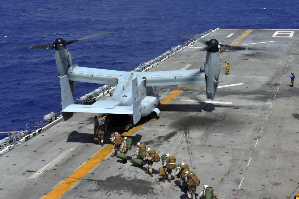 Marines board an MV-22 Osprey on the flight deck of USS Bonhomme Richard Canvas Art - Stocktrek Images (35 x 23)