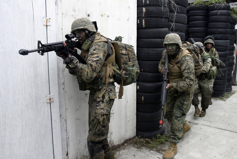 Marines clear a house looking for simulated terrorists during a raid Canvas Art - Stocktrek Images (34 x 23)