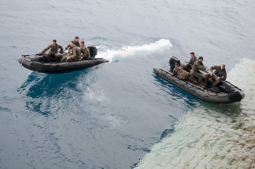 Marines depart the well deck of the amphibious assault ship USS Essex Canvas Art - Stocktrek Images (34 x 23)
