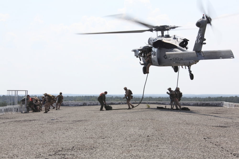 Marines fast-rope onto their objective from a hovering MH-60S Seahawk Canvas Art - Stocktrek Images (34 x 23)