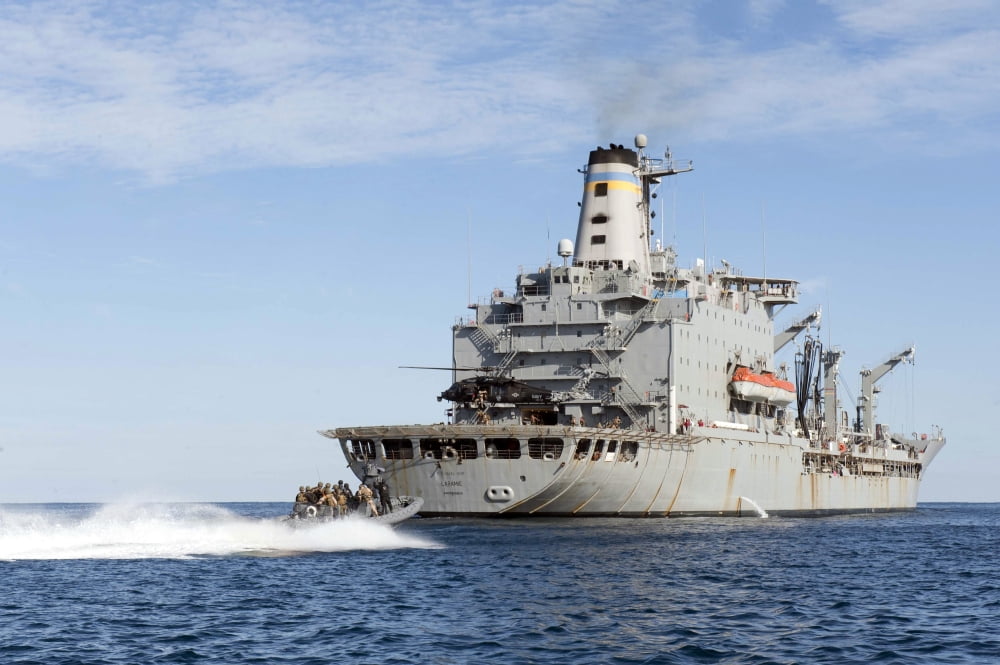 Marines in an inflatable boat head towards USS New York Canvas Art - Stocktrek Images (35 x 23)