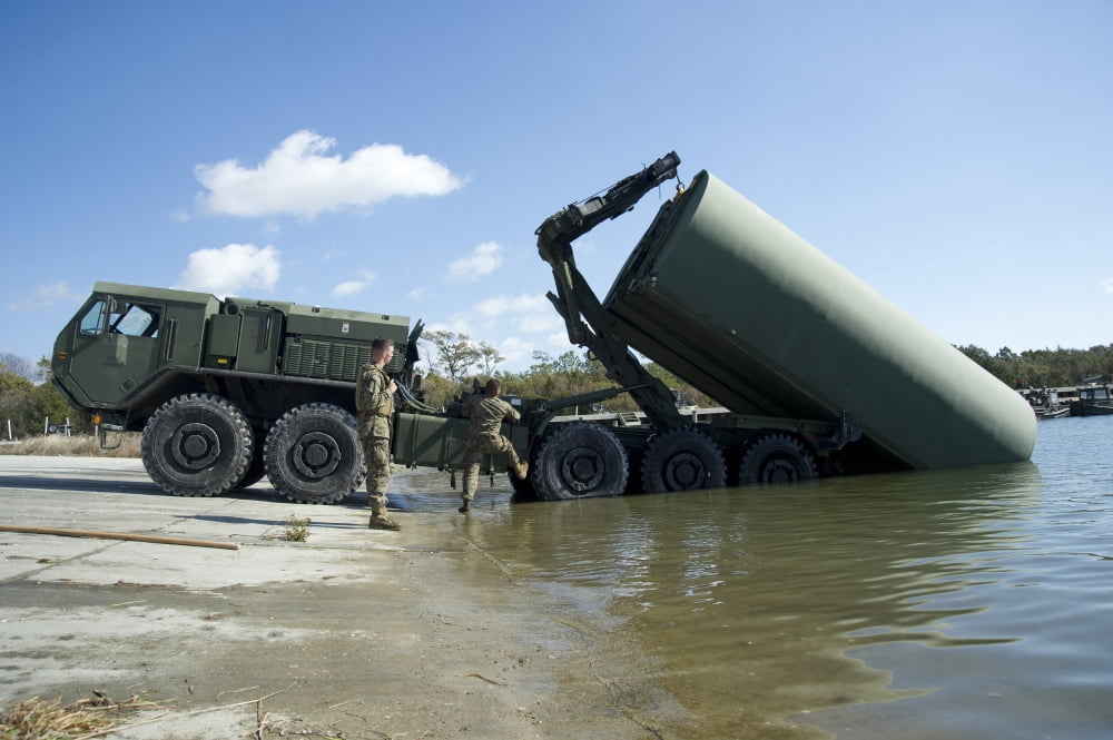 Marines lower an improved ribbon bridge into the water Canvas Art - Stocktrek Images (35 x 23)