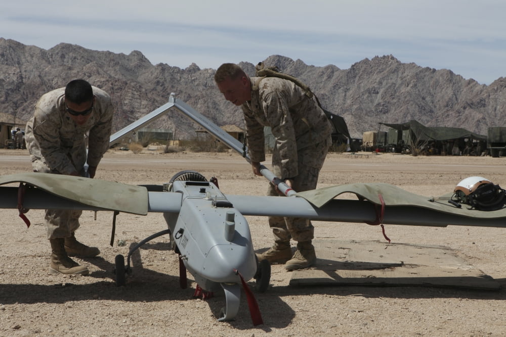 Marines move an RQ-7 Shadow unmanned aerial vehicle Canvas Art - Stocktrek Images (35 x 23)