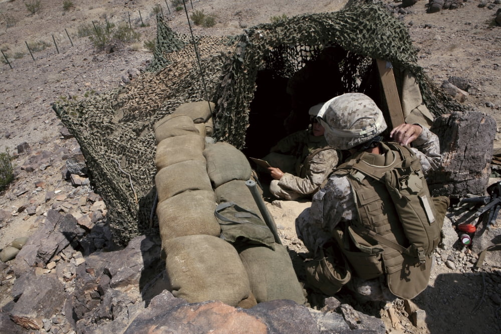 Marines provide security over the Combat Logistics Support Area Canvas Art - Stocktrek Images (34 x 23)