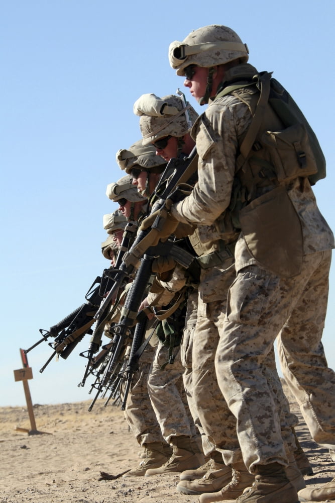 Marines raise their M16A2 service rifles from the alert to the firing position Canvas Art - Stocktrek Images (23 x 34)