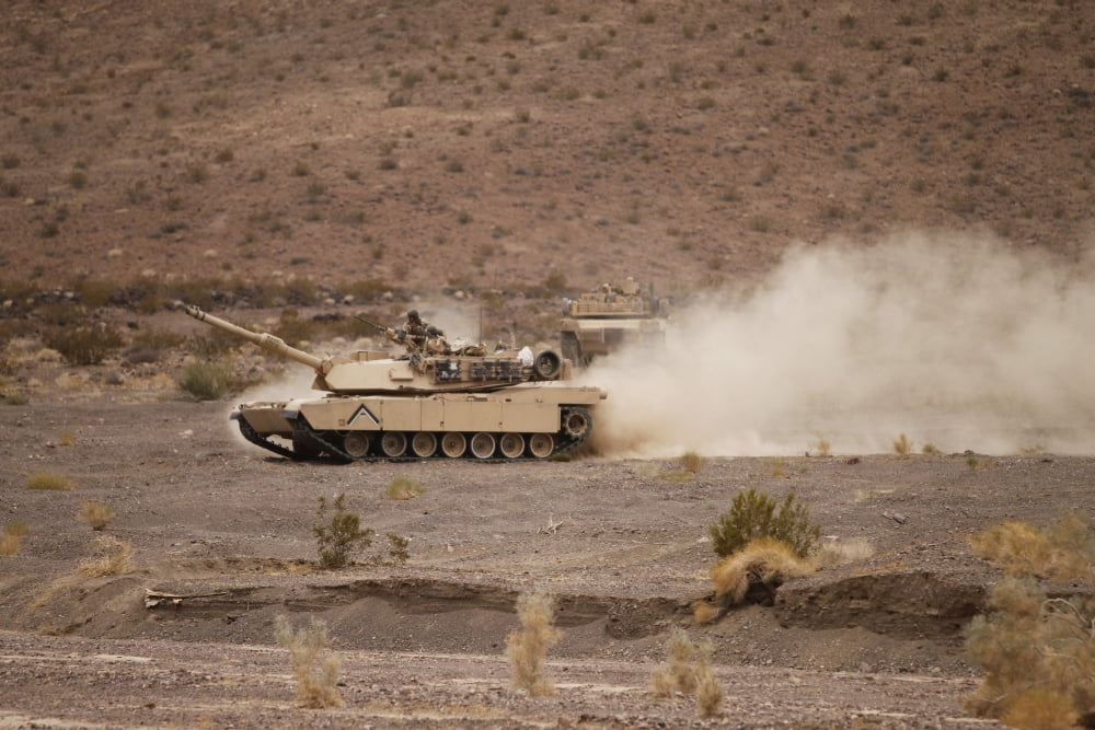 Marines roll through the Combat Center training area during a patrol Canvas Art - Stocktrek Images (35 x 23)