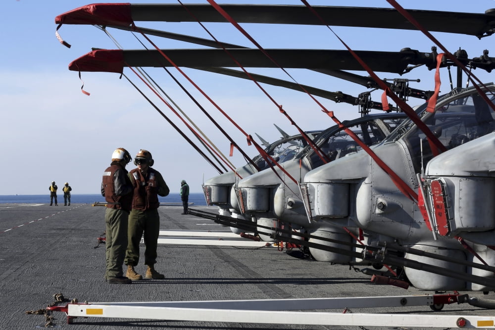 Marines stand next to a row of AH-1N Cobra helicopters Canvas Art - Stocktrek Images (35 x 23)