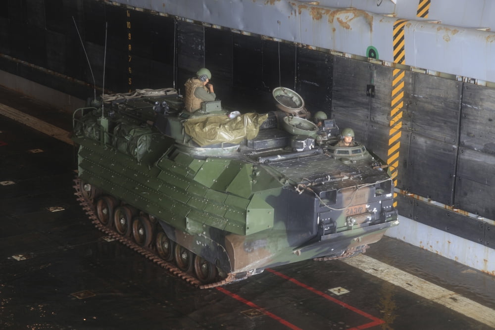 Marines wait to launch their amphibious assault vehicle from the well deck of USS Oak Hill Canvas Art - Stocktrek Images (34 x 23)