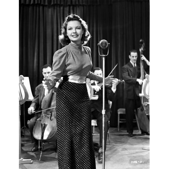 Marjorie Reynolds with a Microphone and Crowd Photo Print (8 x 10)