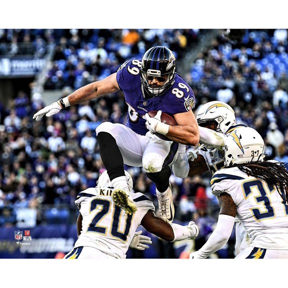 Mark Andrews Baltimore Ravens Unsigned Hurdling Defender Photograph