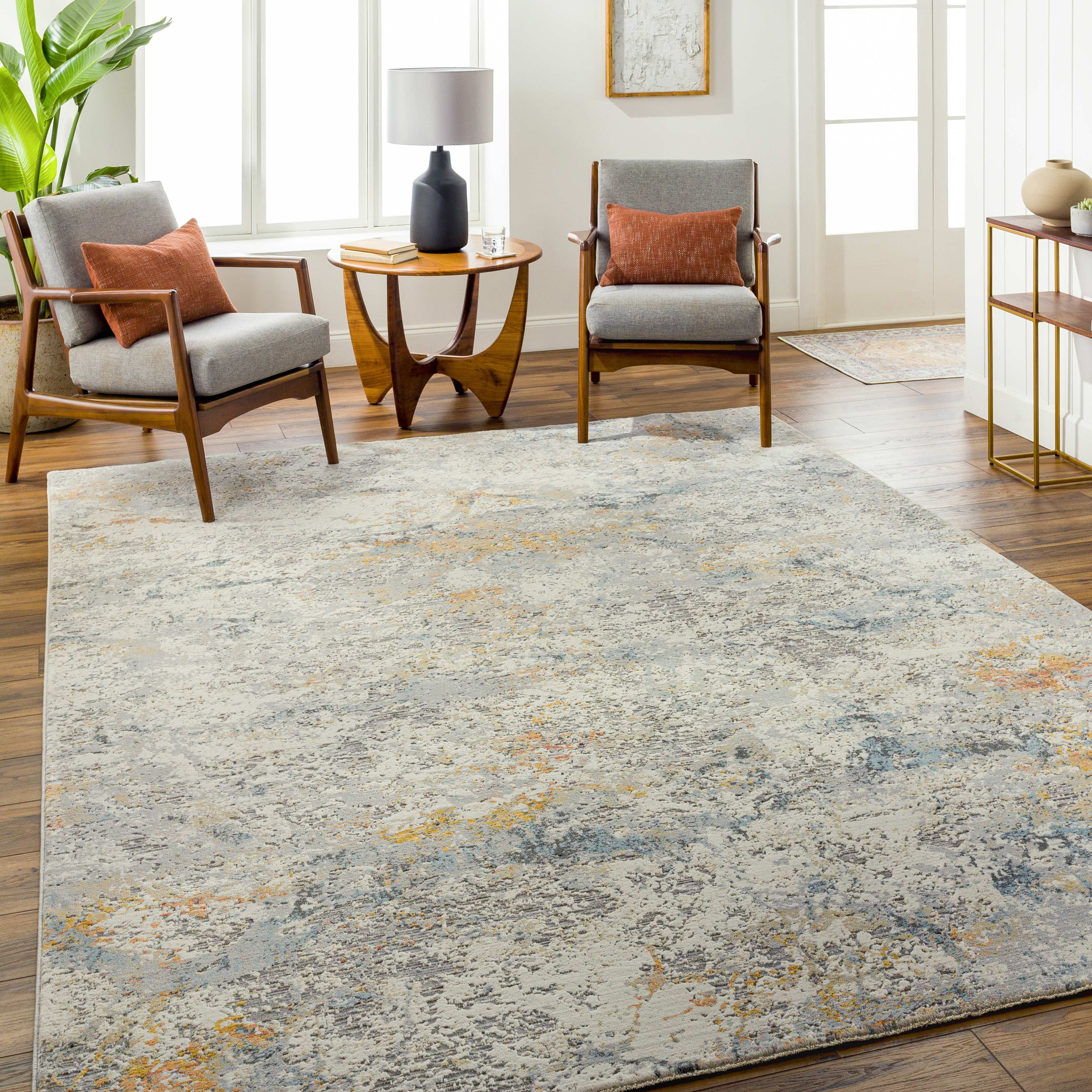 Jaelyn Ivory and Gray 5' x 7'5" Modern Area Rug