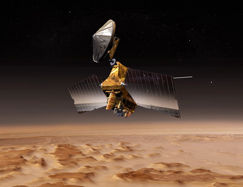 Mars Reconnaissance Orbiter passes above planet Mars Canvas Art - Stocktrek Images (32 x 25)