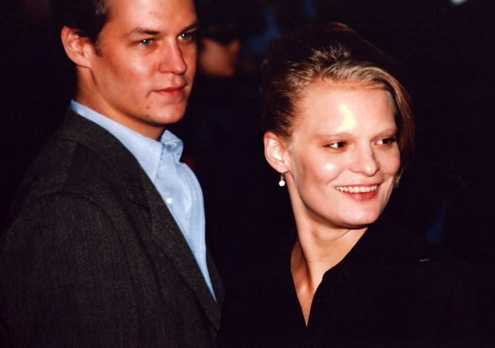 Martha Plimpton Looking To Side With Husband Photo Print (8 x 10