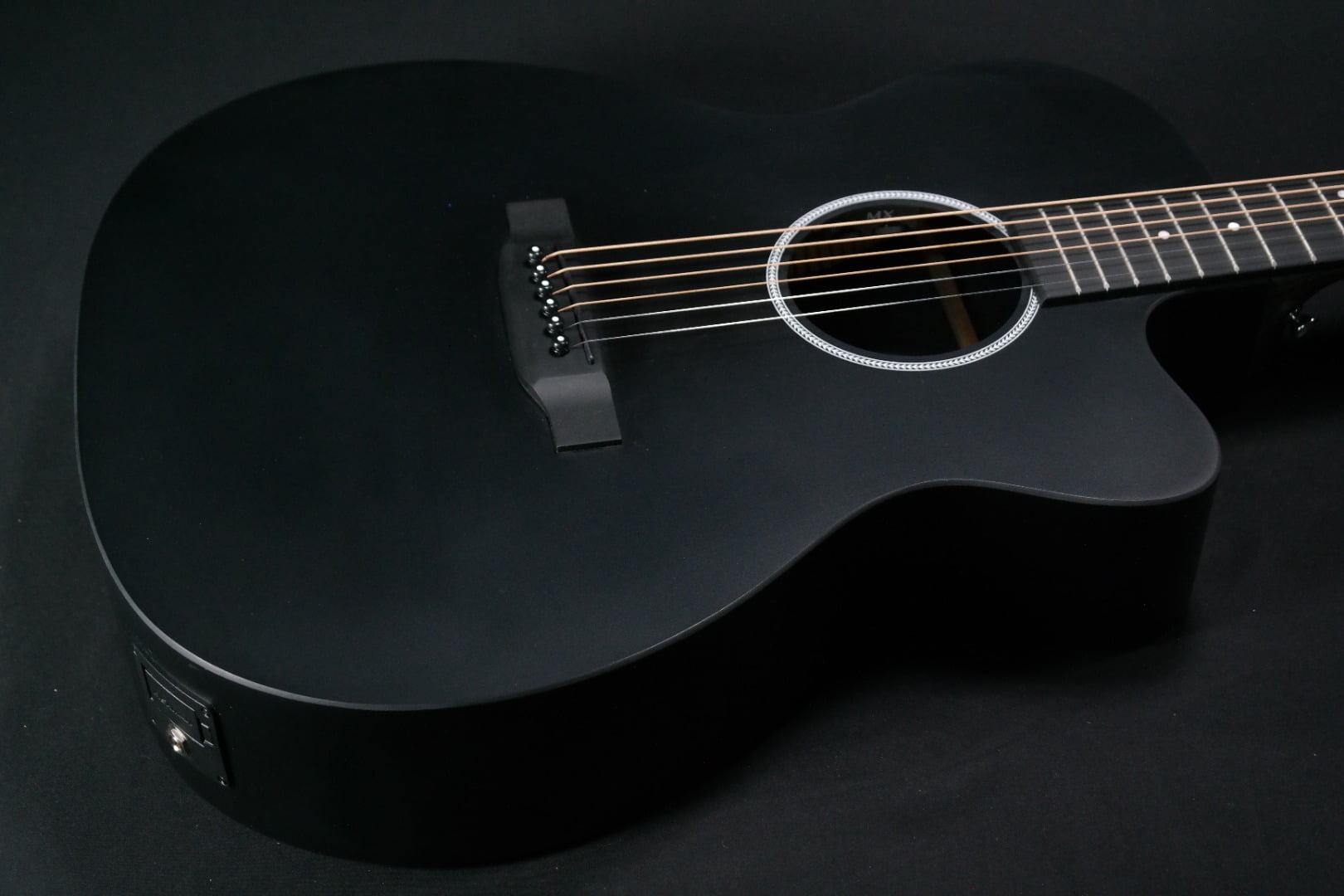 Martin Guitar X Series OMC-X1E Acoustic-Electric Guitar with Gig Bag, Black High-Pressure Laminate, 000-14 Fret, Performing Artist Neck Shape 337