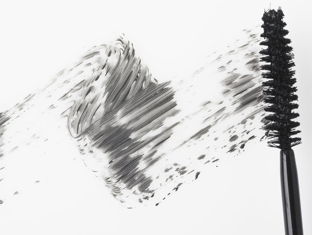 Mascara brush leaving traces of mascara on a white background Canvas Art - Eric Kulin Design Pics (17 x 13)