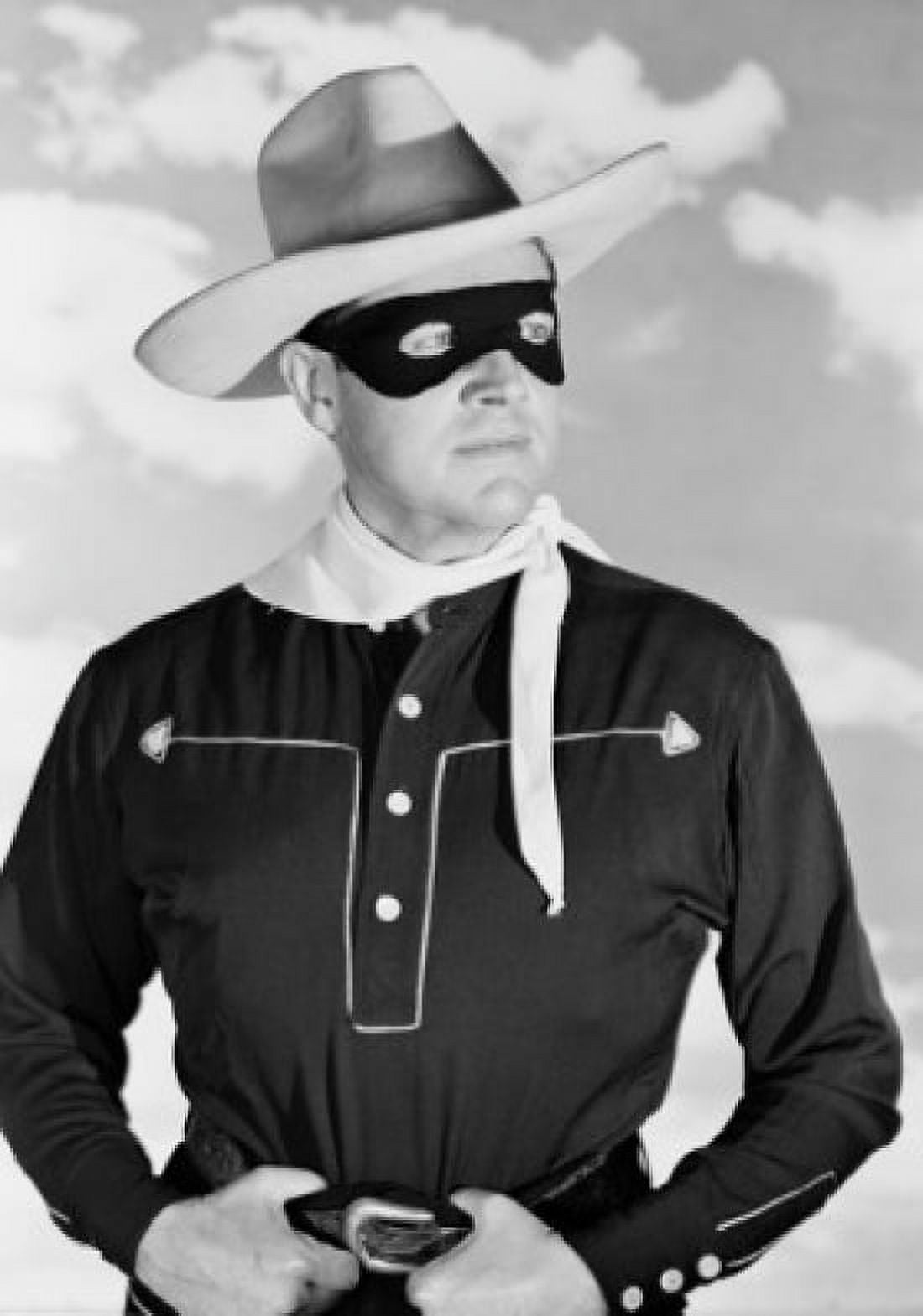 Masked cowboy against cloudy sky Canvas Art - (24 x 36)
