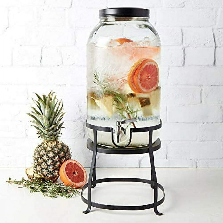 https://i5.walmartimages.com/seo/Mason-Craft-and-More-Glass-Drink-Dispenser-with-Stand_aa99fefc-08ab-40d3-9799-a47e1c224f11.04d6778ae9c1769f31b712b1f4683549.jpeg?odnHeight=768&odnWidth=768&odnBg=FFFFFF