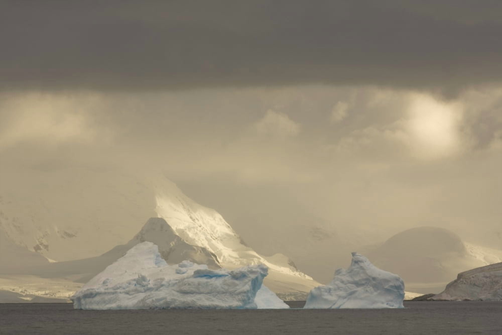 Massive Icebergs Drift Through The Errera Channel In The Antarctic Archipelago Canvas Art - Ron Watts Design Pics (34 x 22)
