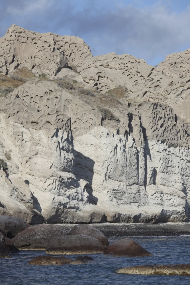 Massive weathered tuff deposits along the south coast of Santorini Greece Canvas Art - Richard RoscoeStocktrek Images (23 x 35)