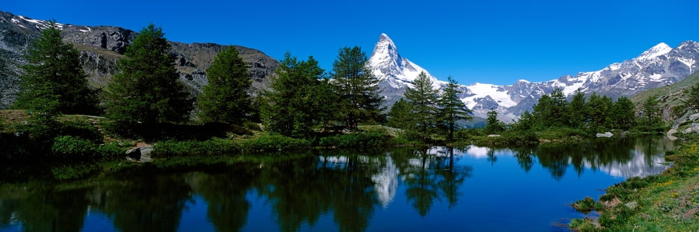 Matterhorn reflecting into Grindjisee Lake Zermatt Valais Canton Switzerland Canvas Art - Panoramic Images (12 x 36)
