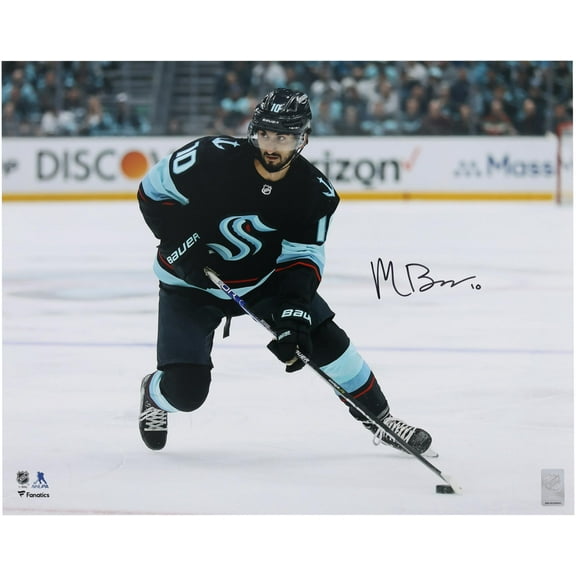 Matty Beniers Seattle Kraken Autographed 16" x 20" Navy Jersey with Puck Photograph - Fanatics Authentic Certified