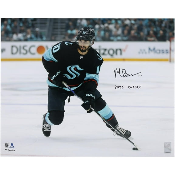 Matty Beniers Seattle Kraken Autographed 16" x 20" Navy Jersey with Puck with "2023 Calder" Inscription - Fanatics Authentic Certified