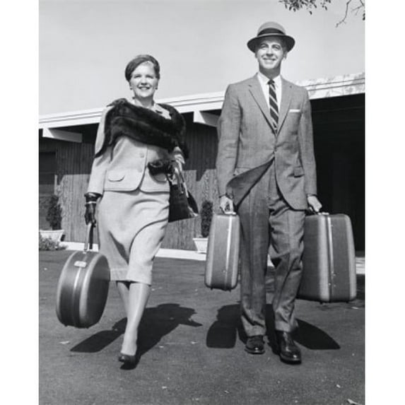 Mature Couple Carrying Their Luggage Poster Print - 18 x 24 in.