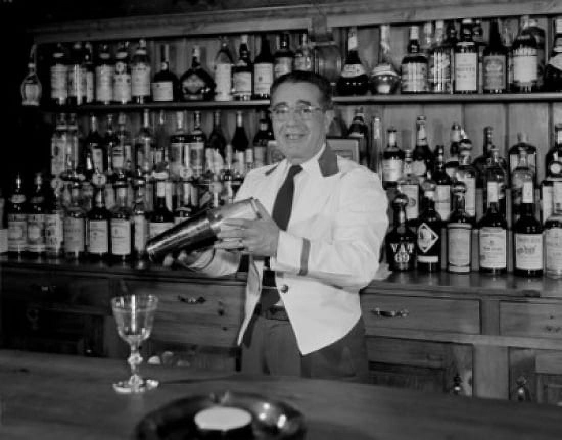 Mature bar tender shaking cocktail Canvas Art - (18 x 24)