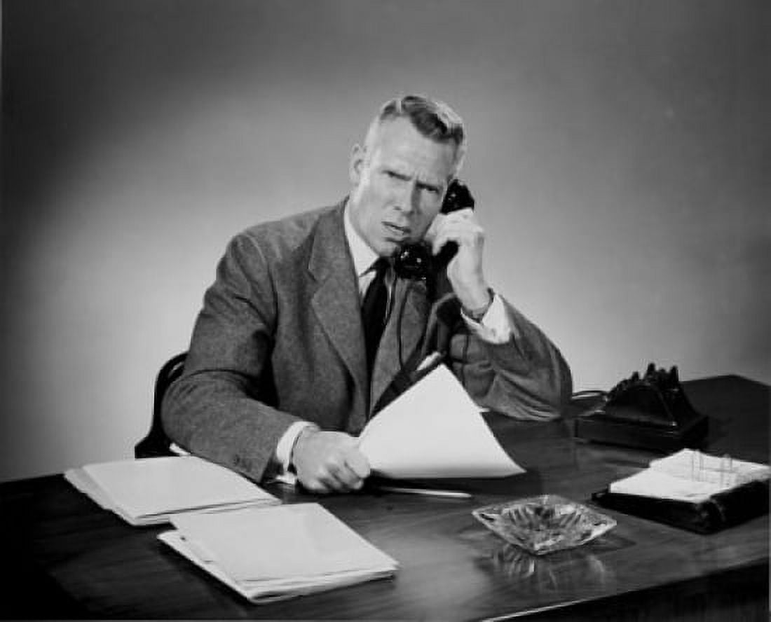 Mature businessman arguing on telephone Canvas Art - (24 x 36)