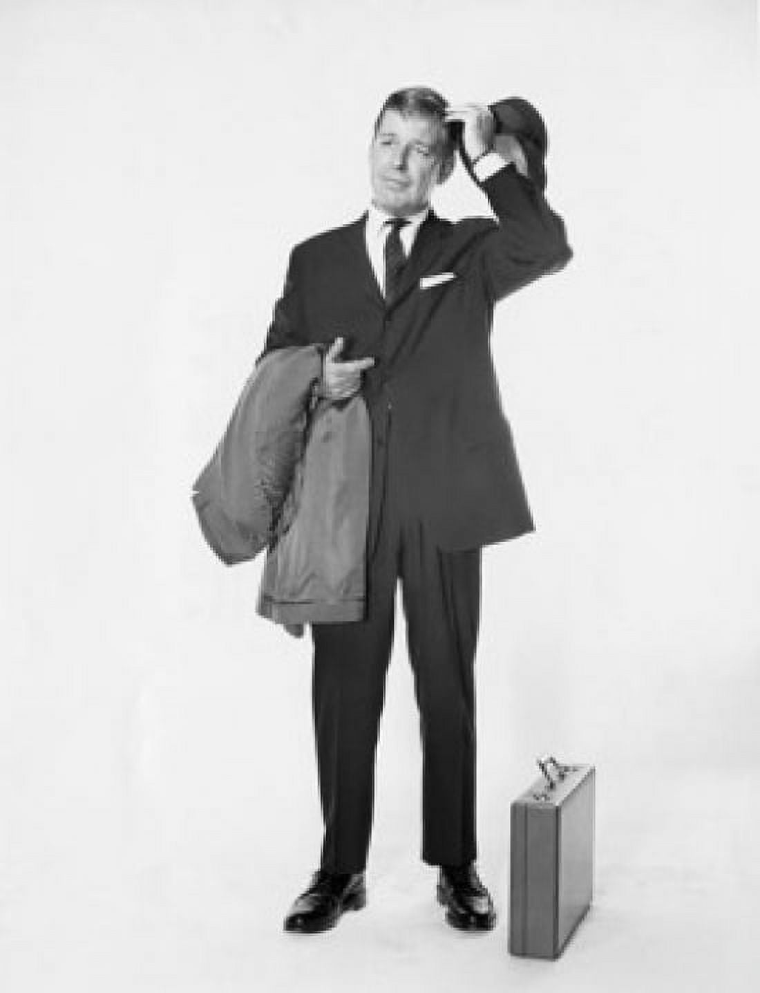 Mature businessman holding hat and overcoat Canvas Art -  (24 x 36)