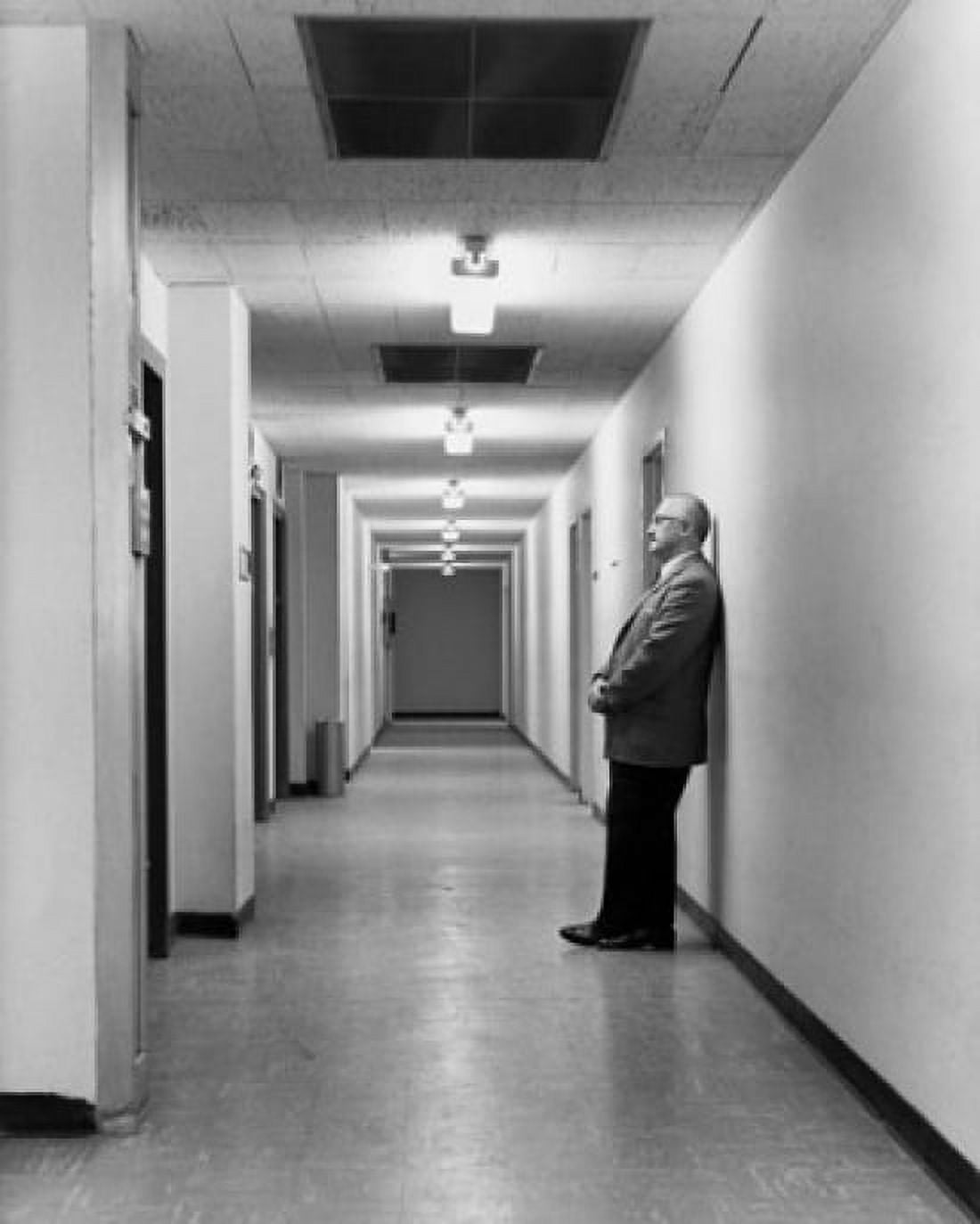 Mature businessman standing in corridor Canvas Art - (18 x 24)