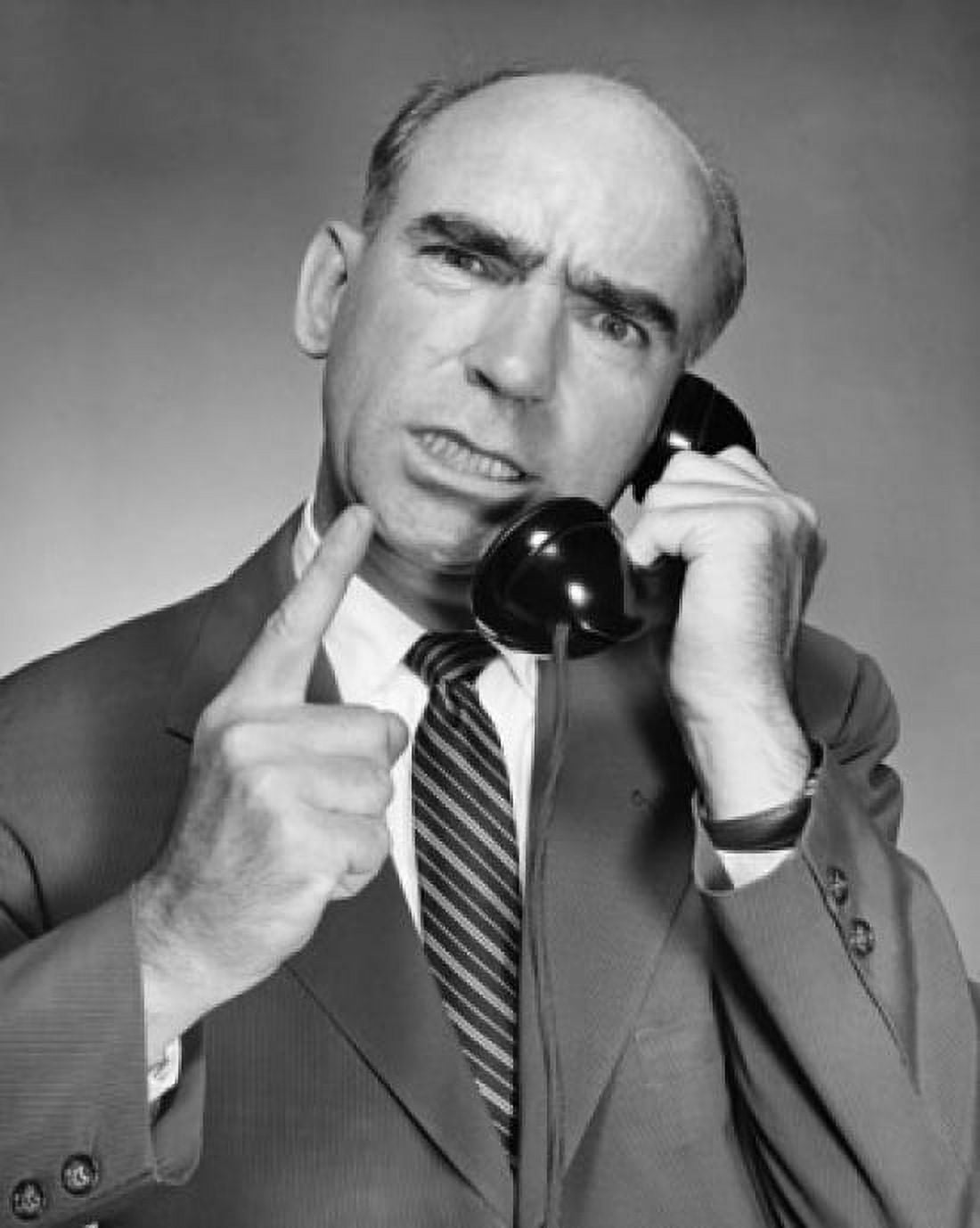 Mature businessman talking on telephone Canvas Art - (24 x 36)